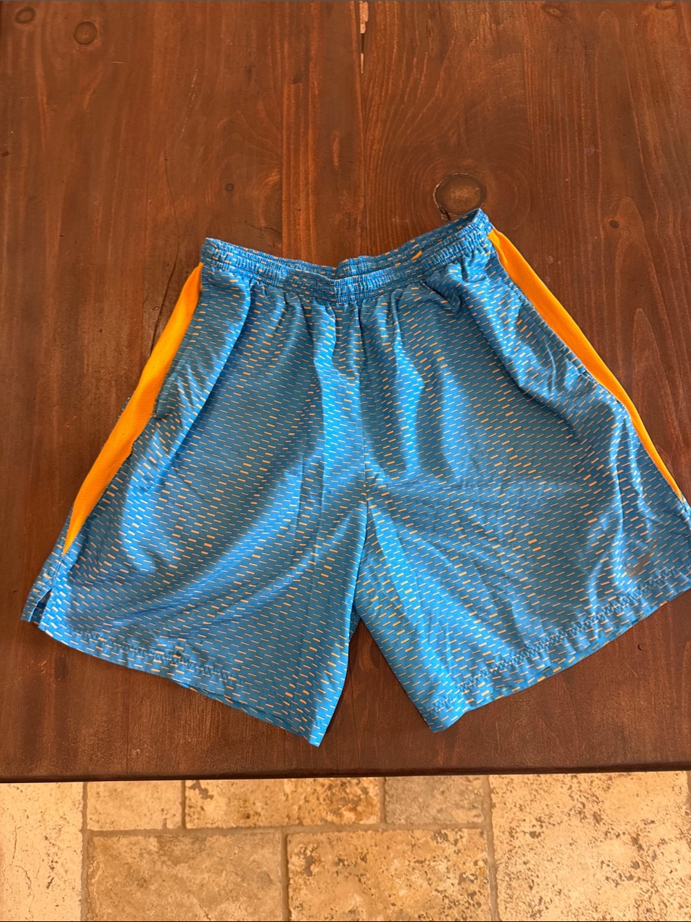 Nike Men’s Blue Athletic Shorts with Yellow Side Panels